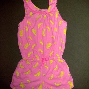 pink sleeveless banana print romper w/tassel trim